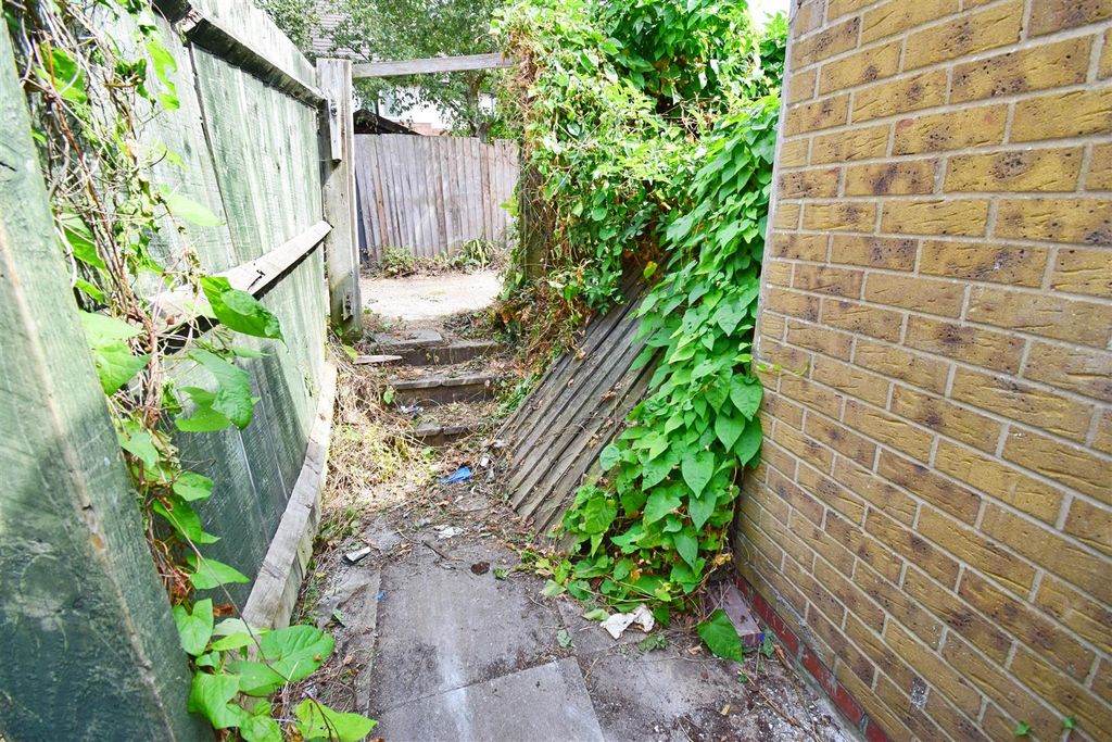 Property photo 3 of 11 Rear Walkway.Jpg