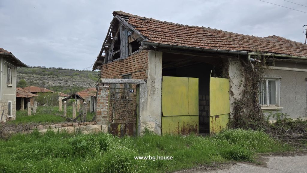 Property photo 3 of 60 Barn Structure With Yellow Metal Double Doors And Brick Walls Adjacent To The House