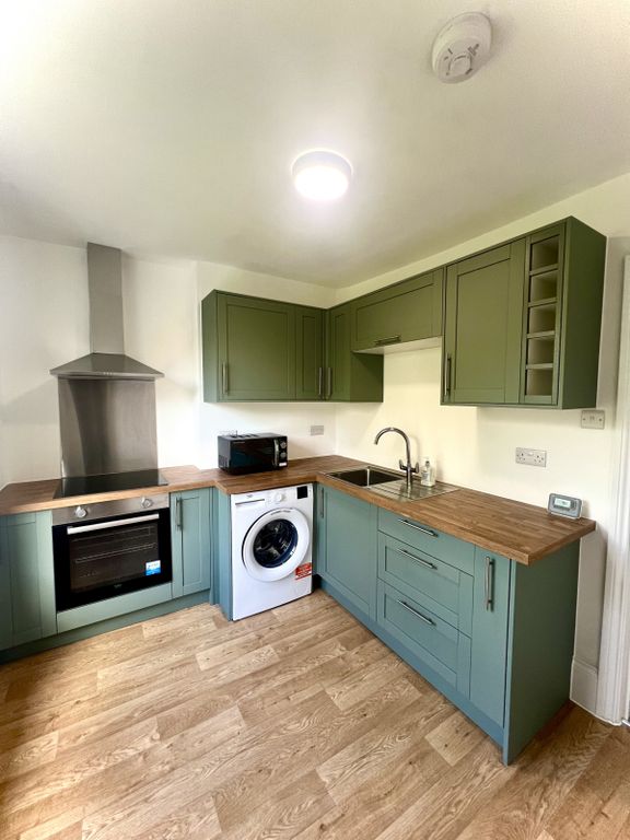 Property photo 2 of 11 Kitchen