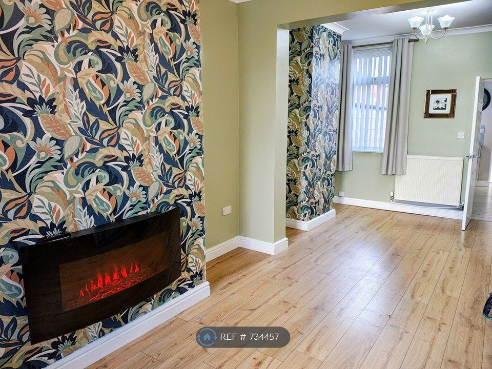 Property photo 1 of 24 Living Room Viewed From Front To Back