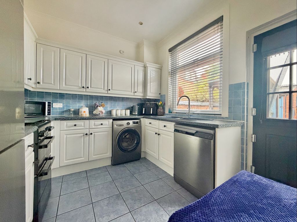 Property photo 3 of 11 Kitchen