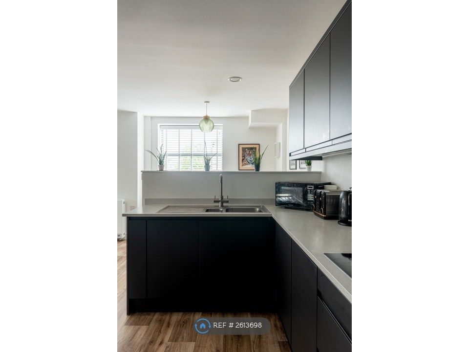 Property photo 3 of 13 Kitchen