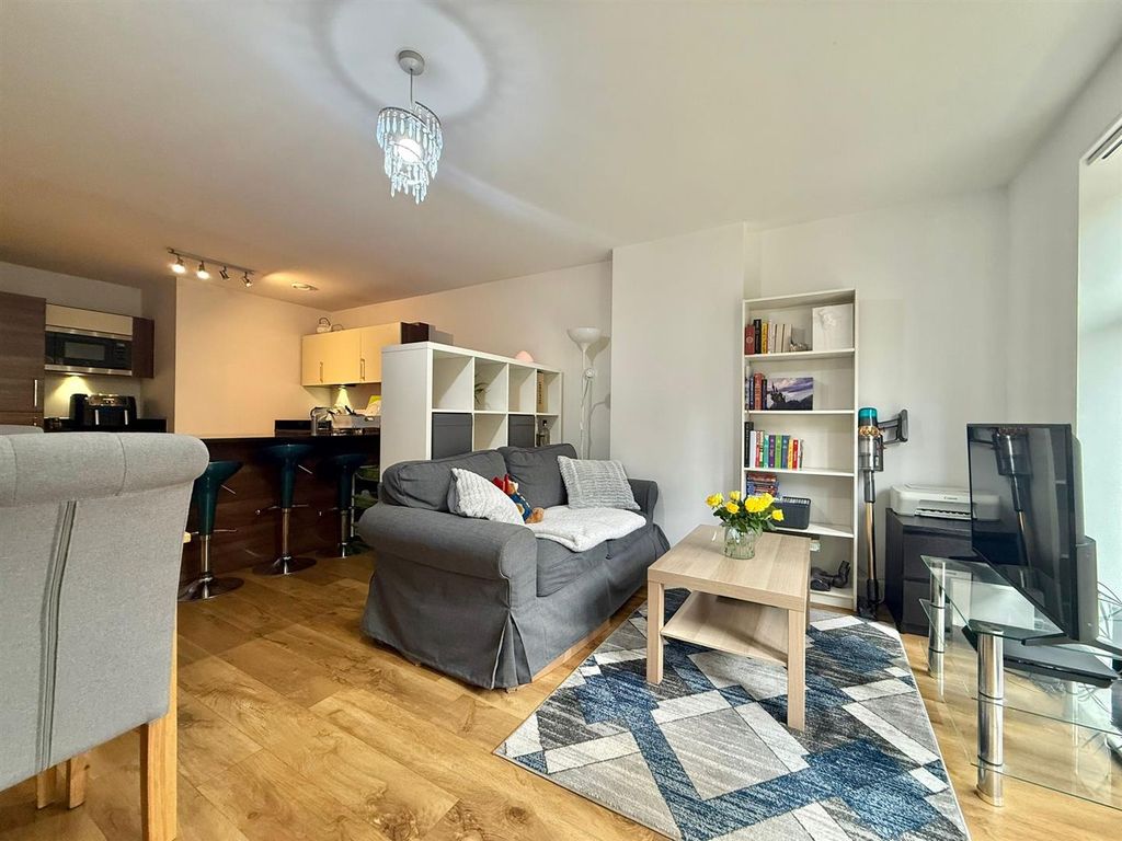 Property photo 3 of 8 Living Area