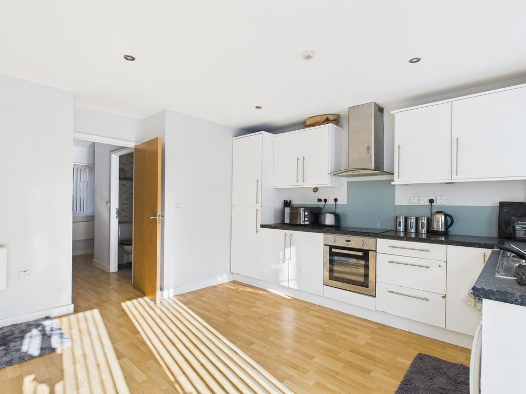 Property photo 2 of 11 Kitchen/Dining/Living