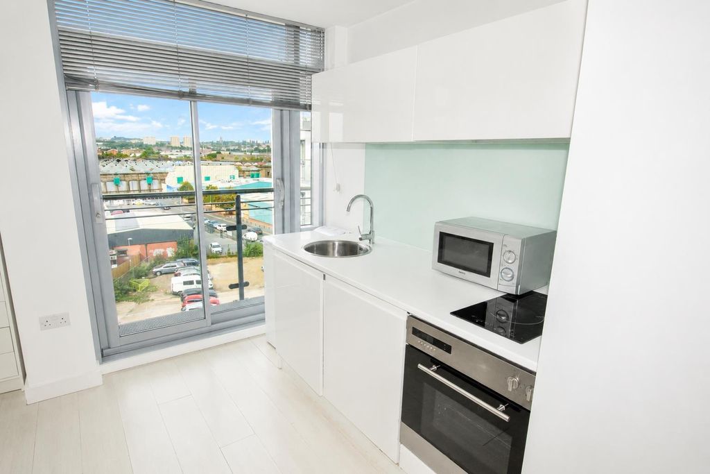 Property photo 3 of 7 Bright Modern Kitchenette With A Stunning View...