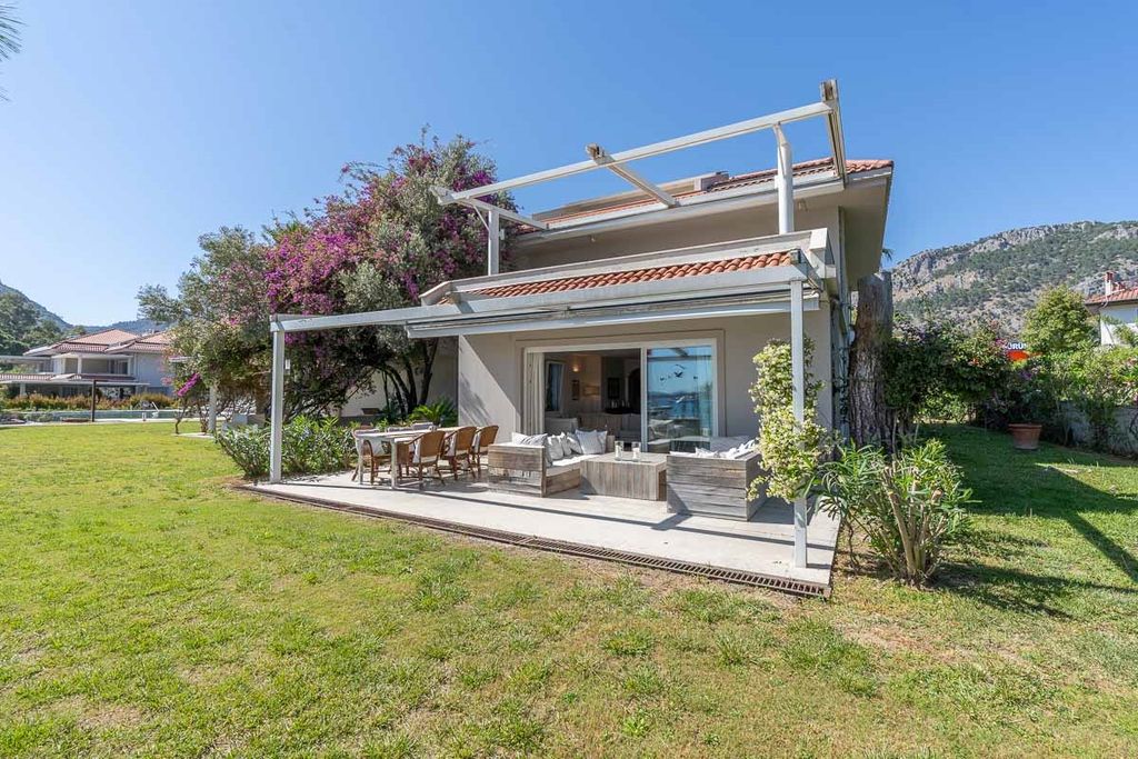 Property photo 3 of 27 An Attractive Seafront Garden Apartment In Gocek For Sale - A Gorgeous Garden Apartment With Large Veranda