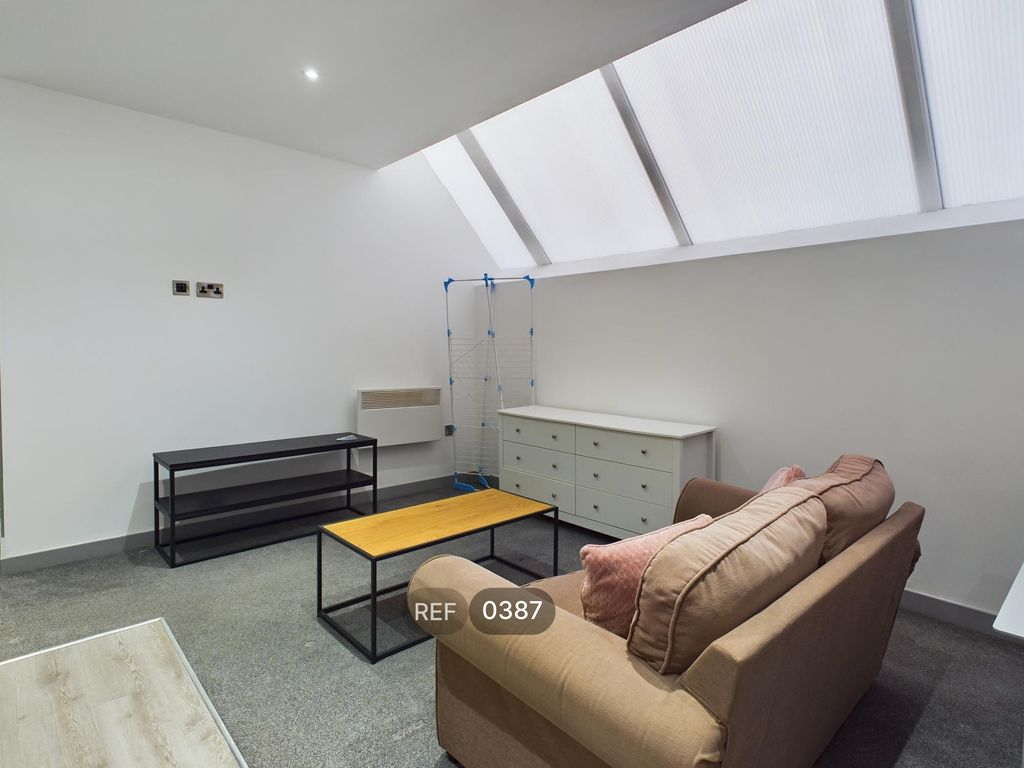 Property photo 3 of 12 Kitchen & Living Area