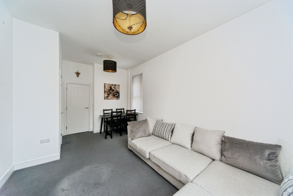 Property photo 2 of 8 Living Room