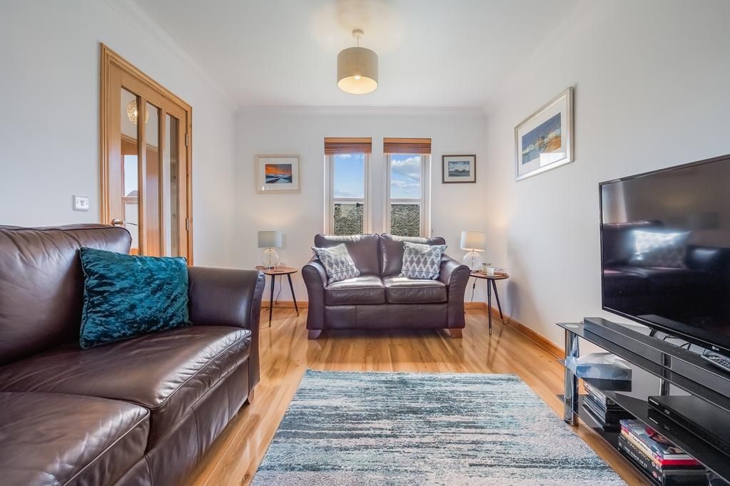 Property photo 2 of 26 Cup1470Seg Living Room.Jpg