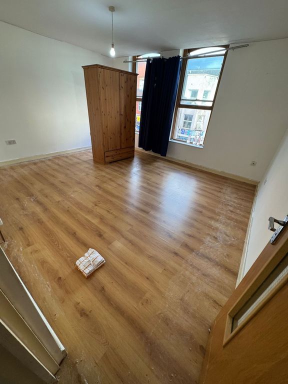 Property photo 3 of 4 Spacious Bright Bedroom With Sleek Wood Flooring...