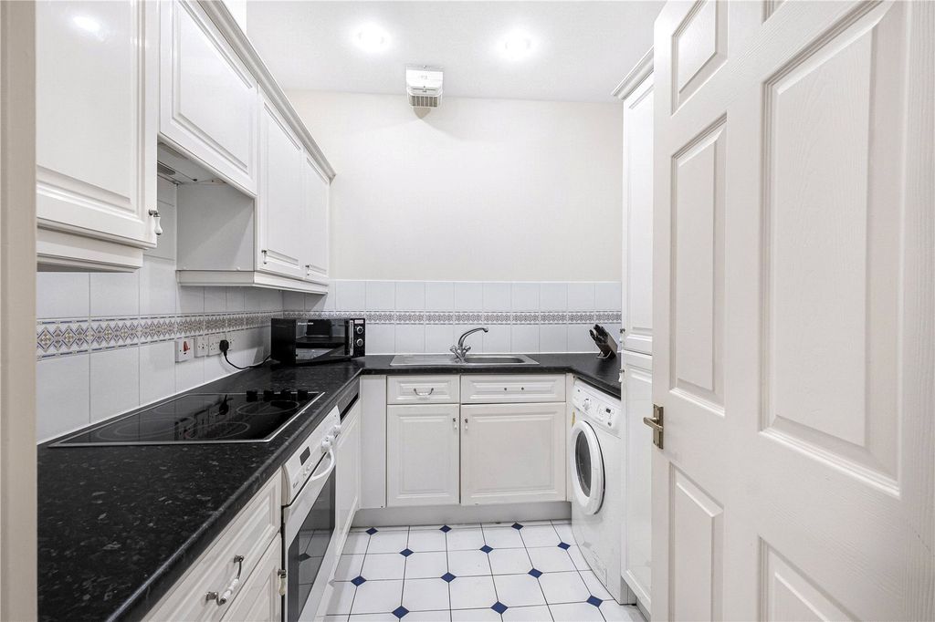Property photo 3 of 9 Kitchen
