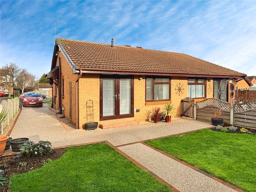 Property photo 2 of 19 Rear Patio & Drive