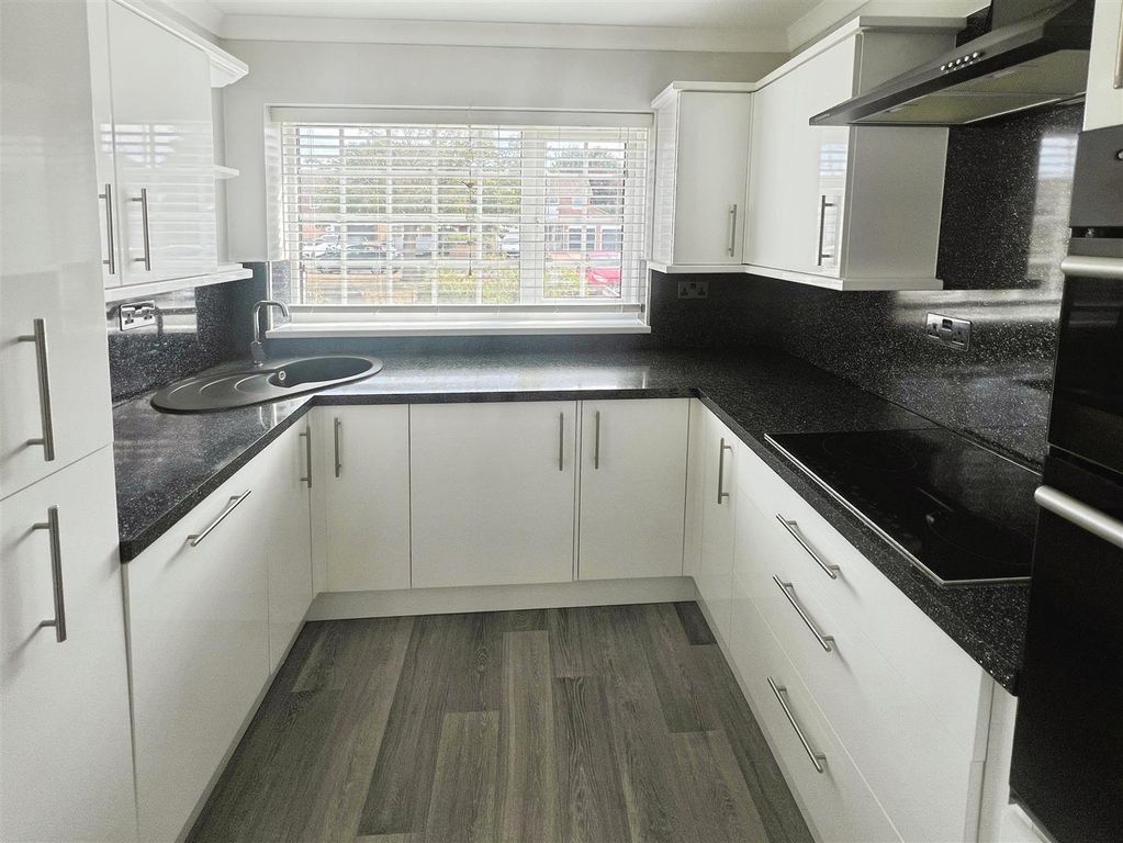 Property photo 2 of 12 Kitchen