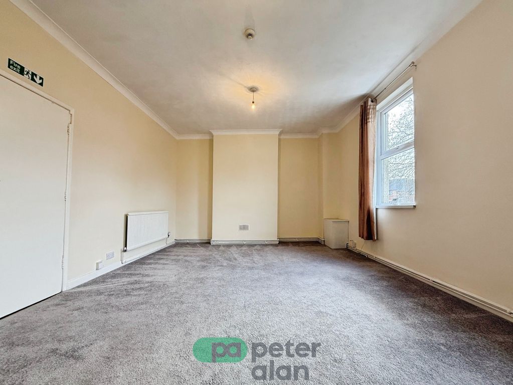 Property photo 3 of 8 Front