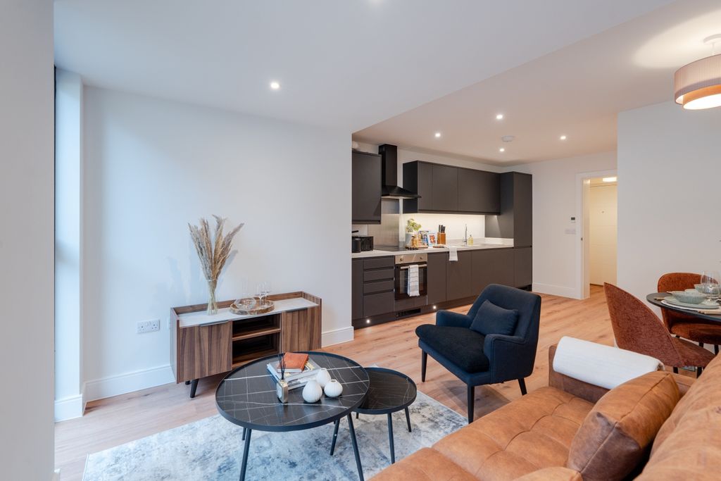 Property photo 3 of 12 Kitchen Living Area