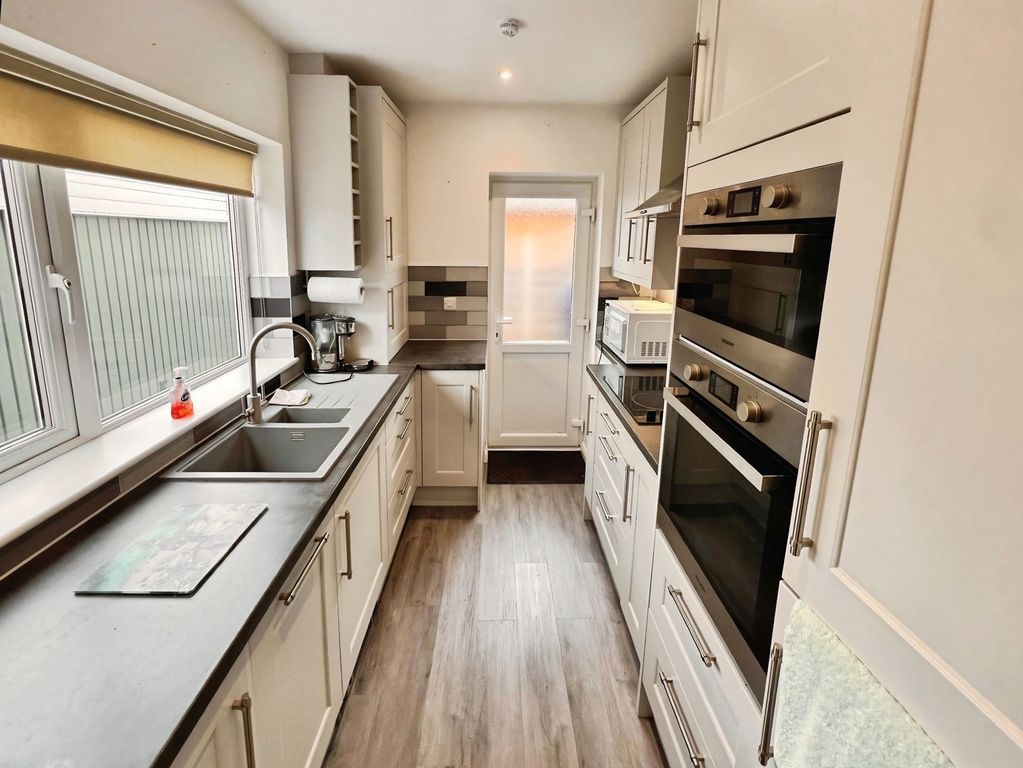 Property photo 3 of 13 Kitchen