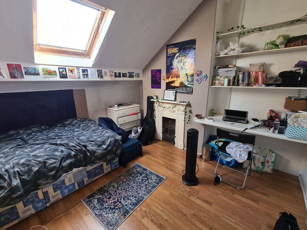 Property photo 3 of 28 A Cozy Bedroom Featuring A Comfortable Double Bed,...