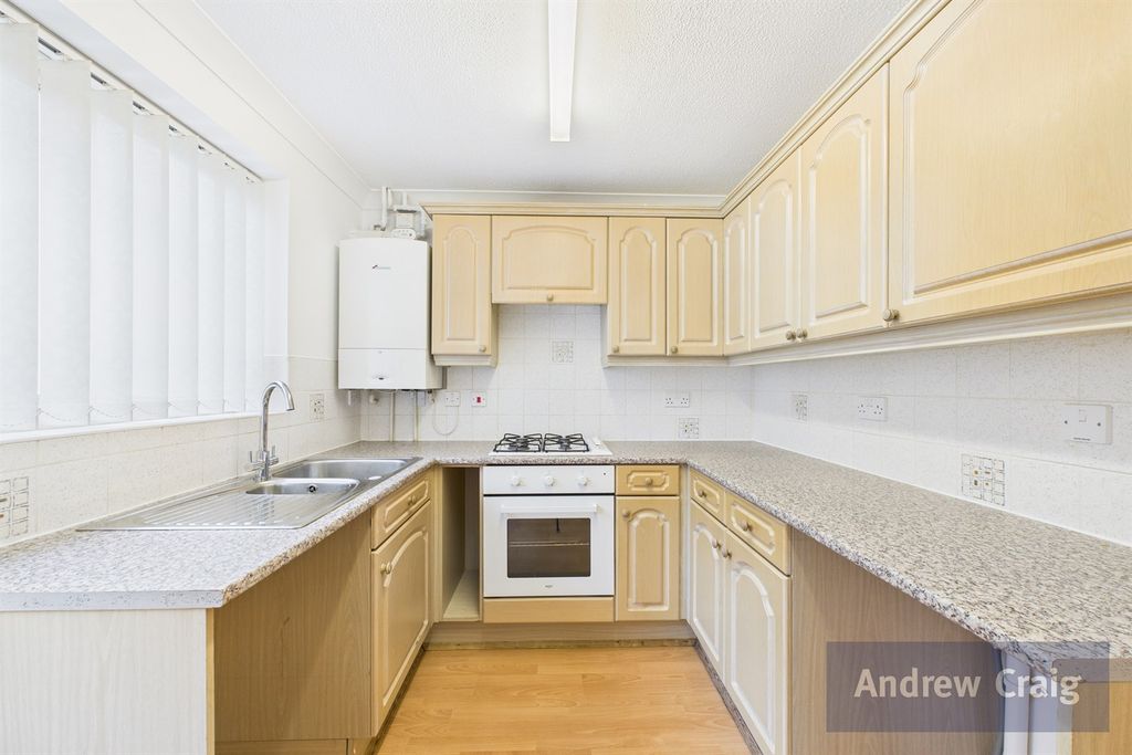 Property photo 3 of 12 Kitchen