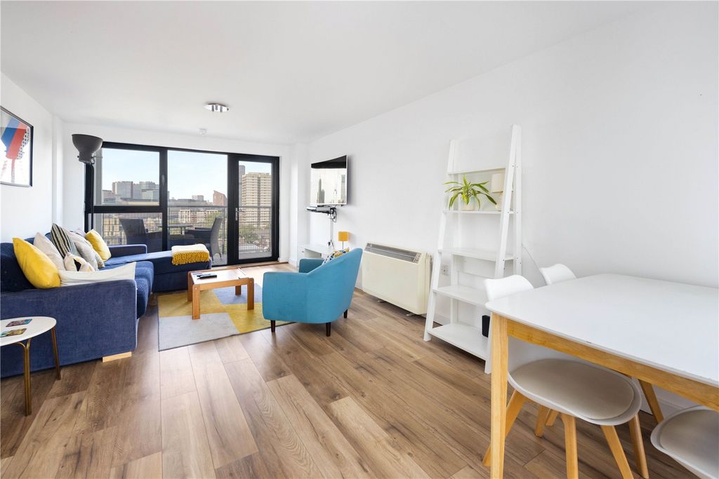 Property photo 3 of 16 Living Area