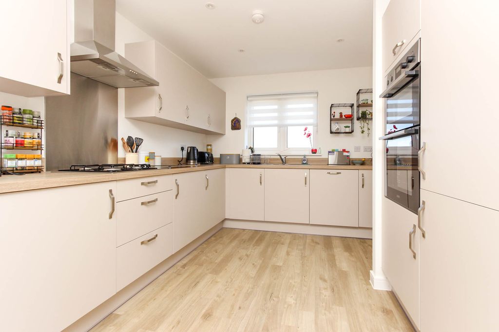 Property photo 2 of 15 Kitchen Area