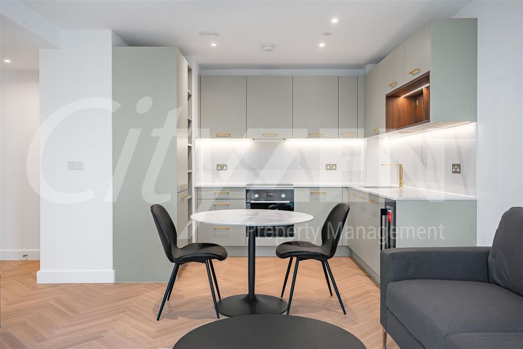 Property photo 3 of 18 Dining Area/Kitchen