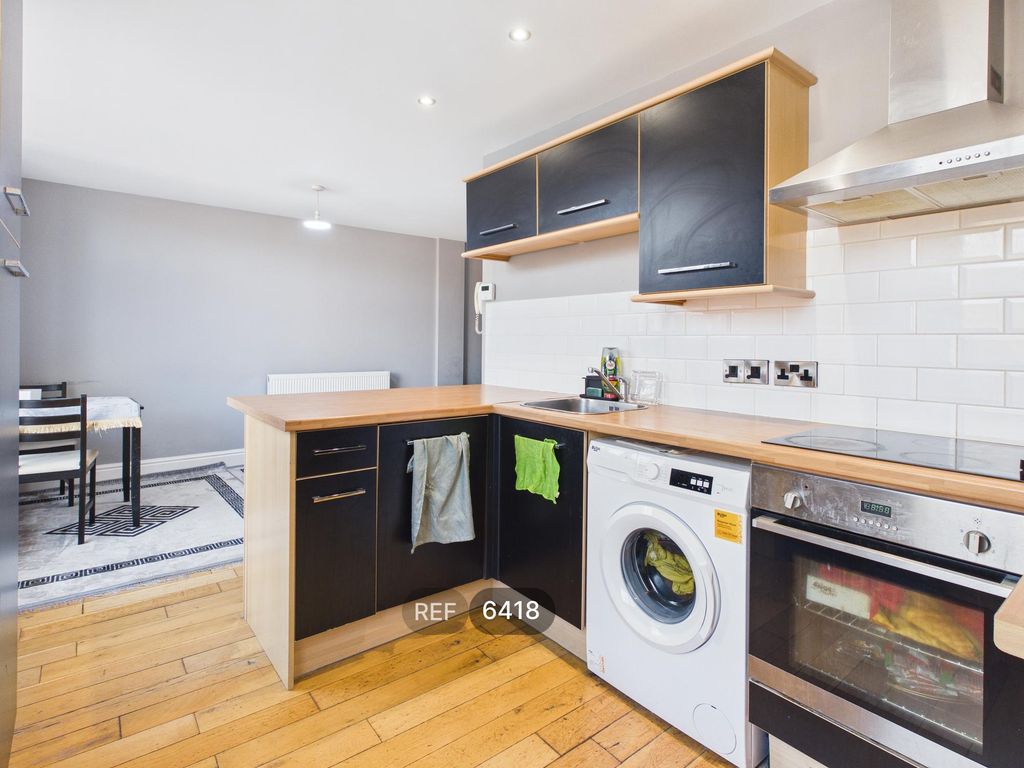 Property photo 2 of 16 Kitchen / Living Area