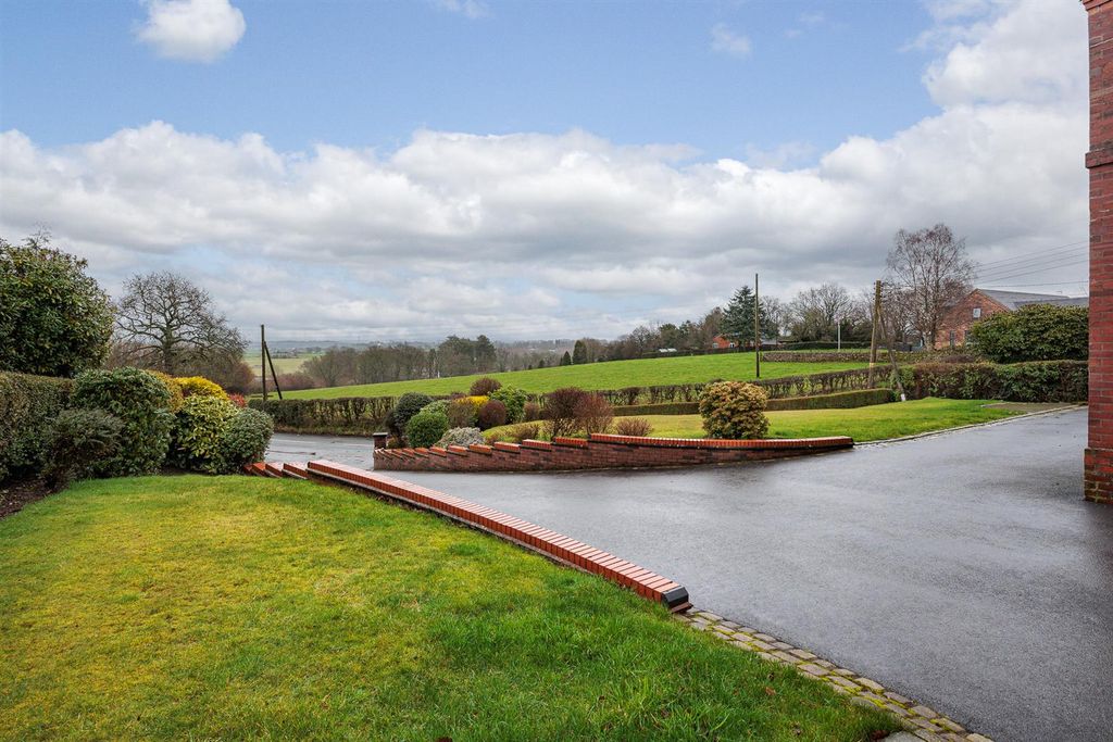 Property photo 2 of 38 View From Driveway