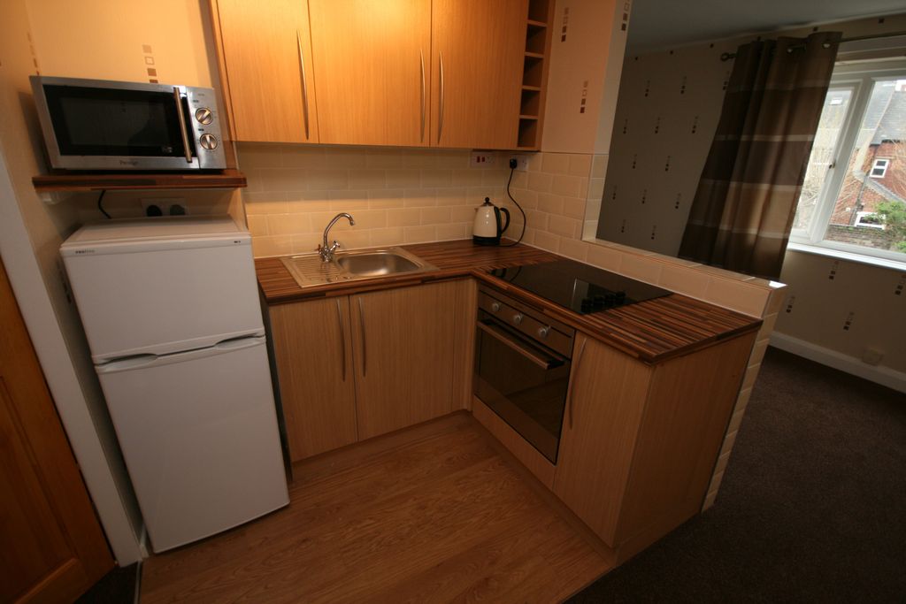 Property photo 2 of 3 Kitchen Area