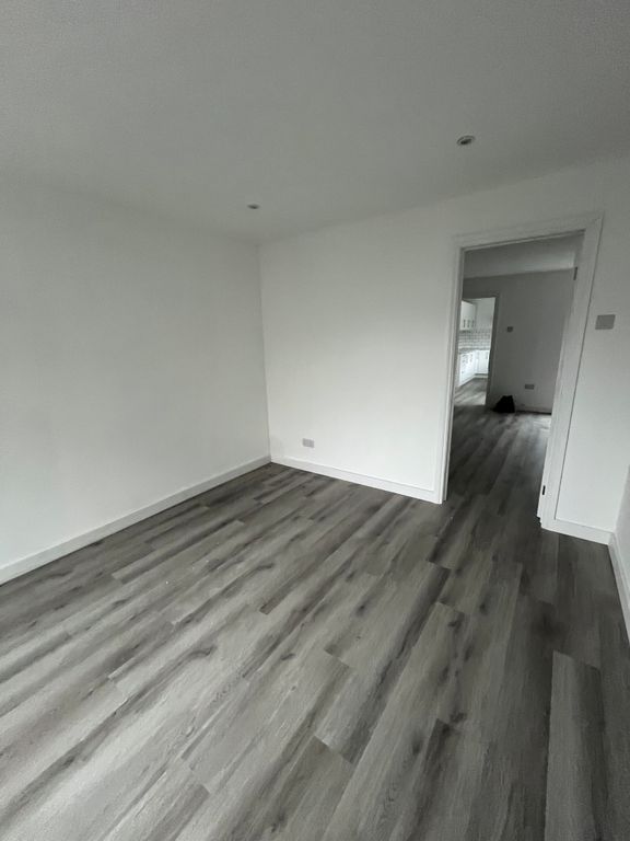 Property photo 2 of 8 Front Living Room