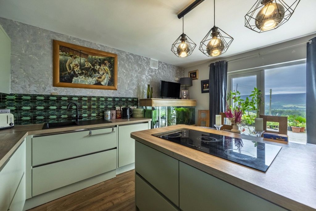 Property photo 3 of 13 Dining Kitchen