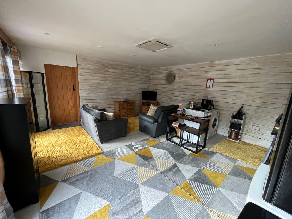 Property photo 3 of 11 Living Area