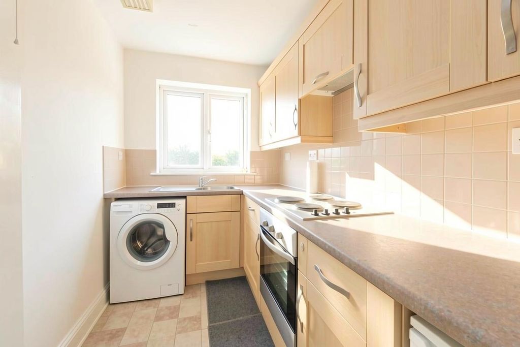Property photo 3 of 7 Kitchen