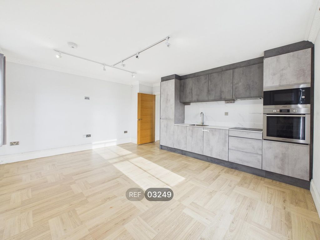 Property photo 1 of 16 Kitchen / Living Area