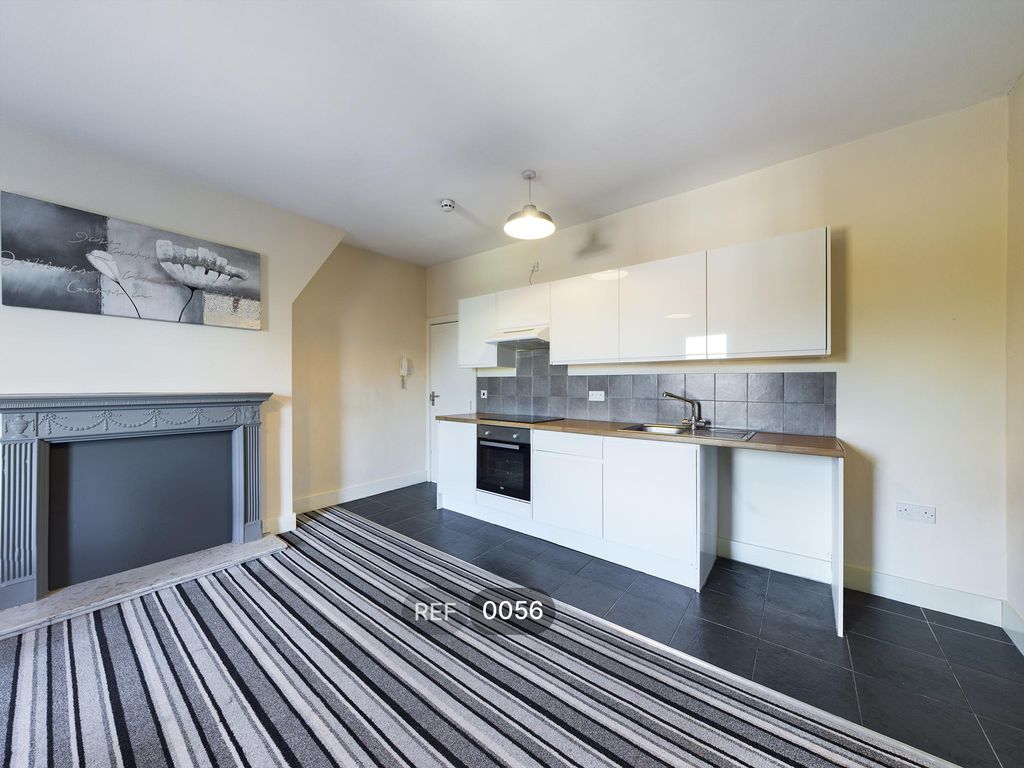 Property photo 1 of 7 Kitchen & Living Area