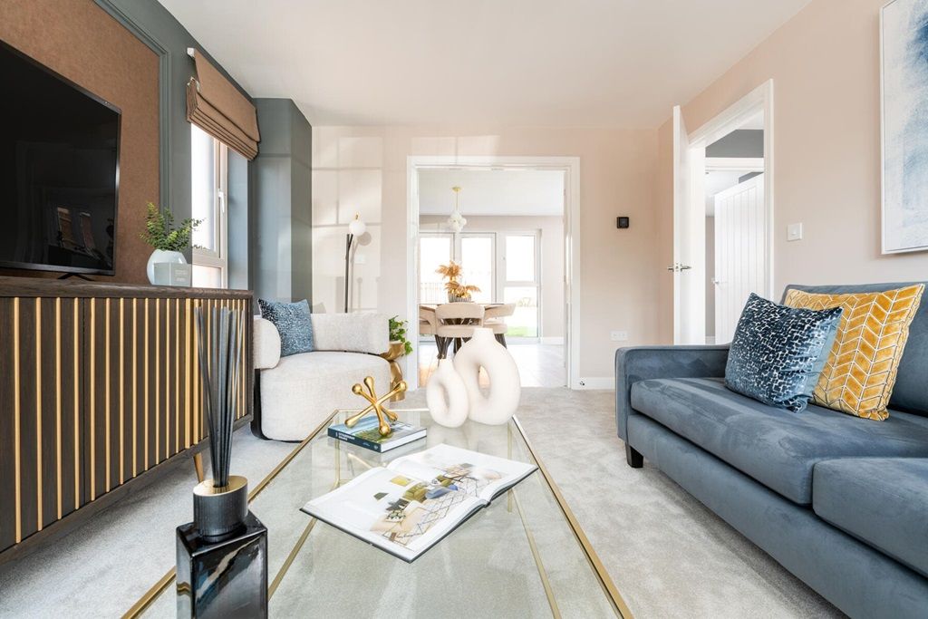 Property photo 3 of 13 The Living Room Opens Up To The Dining Area