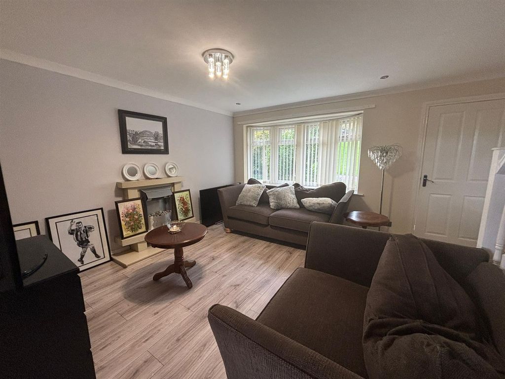 Property photo 2 of 12 Living Room 1