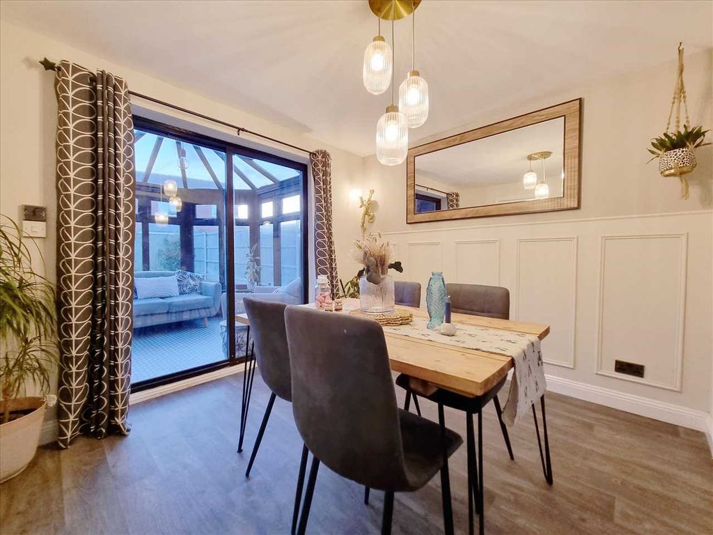 Property photo 3 of 12 Dining Room: