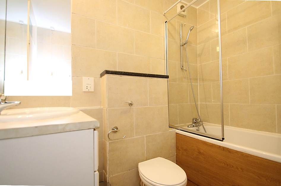 Property photo 2 of 19 Tiled Bathroom