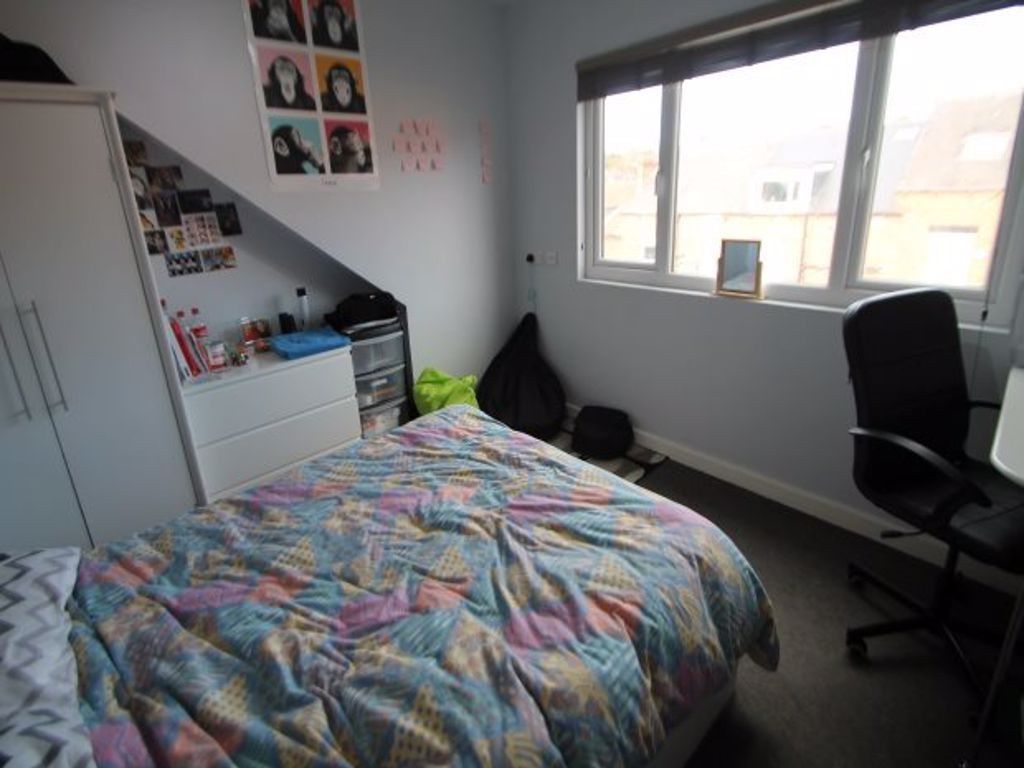 Property photo 1 of 19 A Well-Lit, Inviting Master Bedroom Featuring A Co...