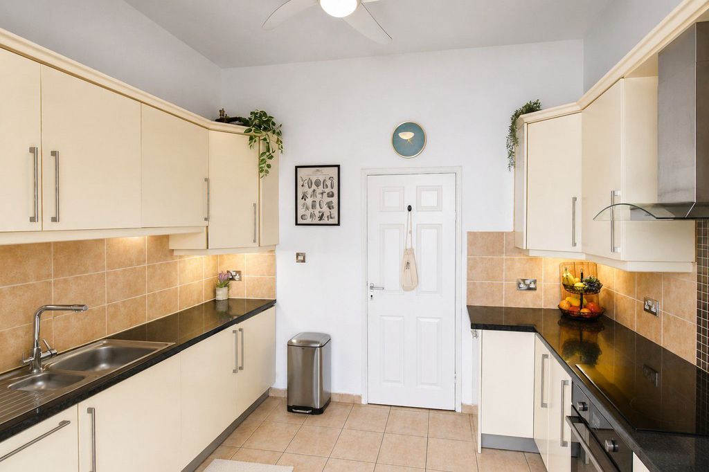 Property photo 3 of 12 Kitchen Area