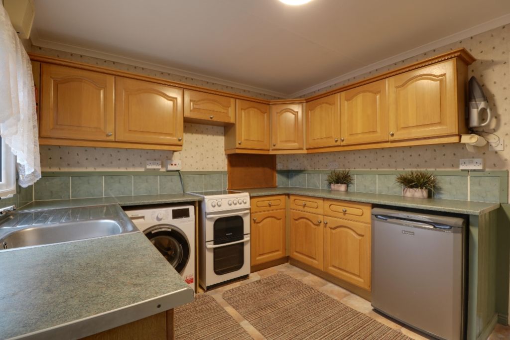 Property photo 2 of 12 Kitchen