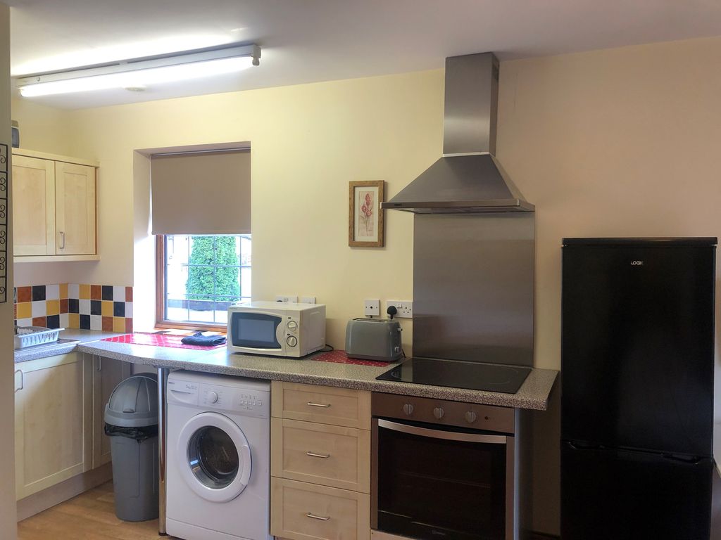 Property photo 3 of 4 Kitchen