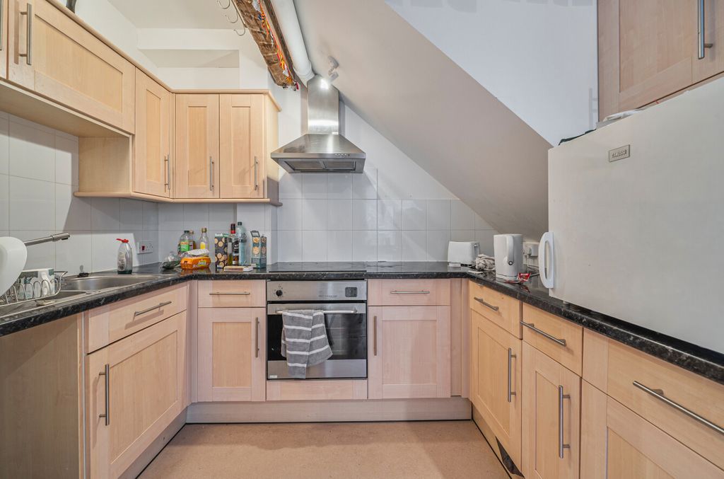 Property photo 3 of 21 Kitchen Area