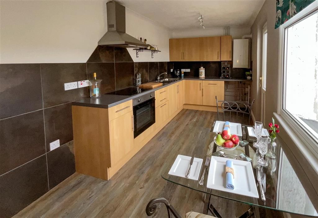 Property photo 2 of 7 Kitchen New