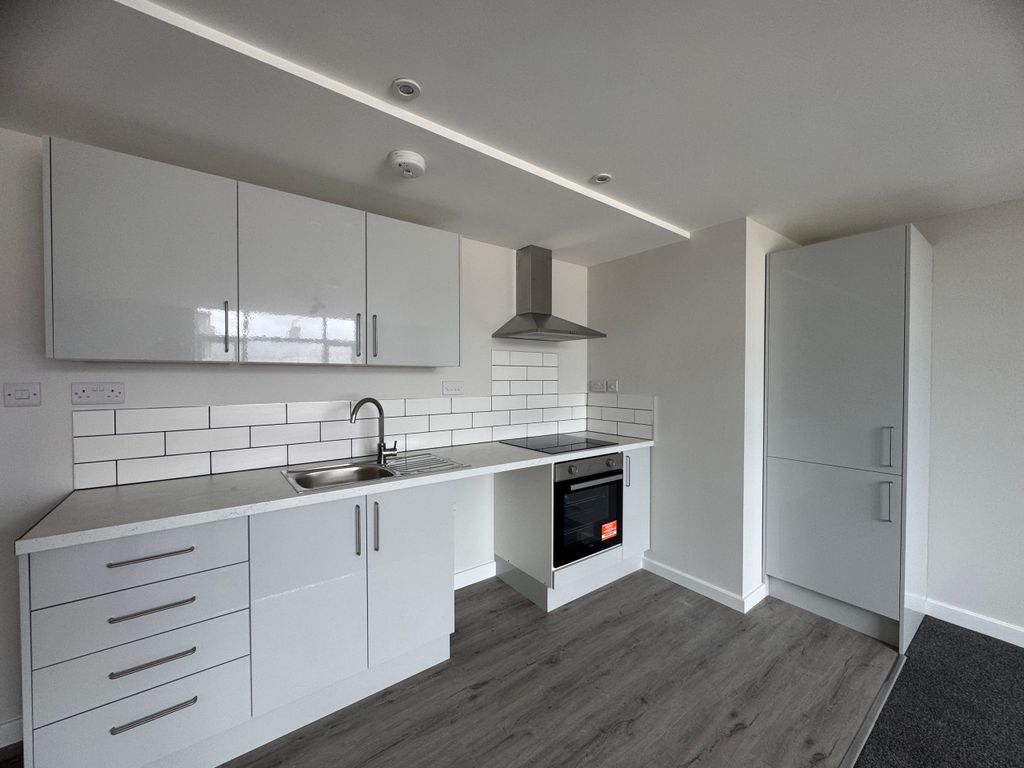 Property photo 1 of 4 Kitchen Area
