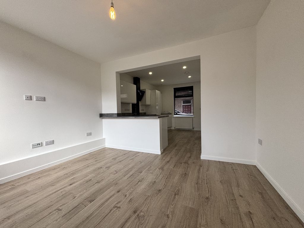 Property photo 3 of 6 Kitchen And Living