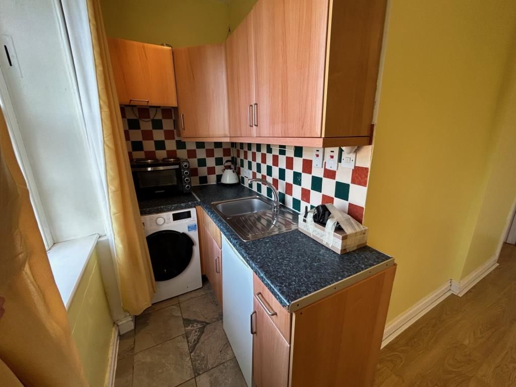 Property photo 3 of 4 Kitchen