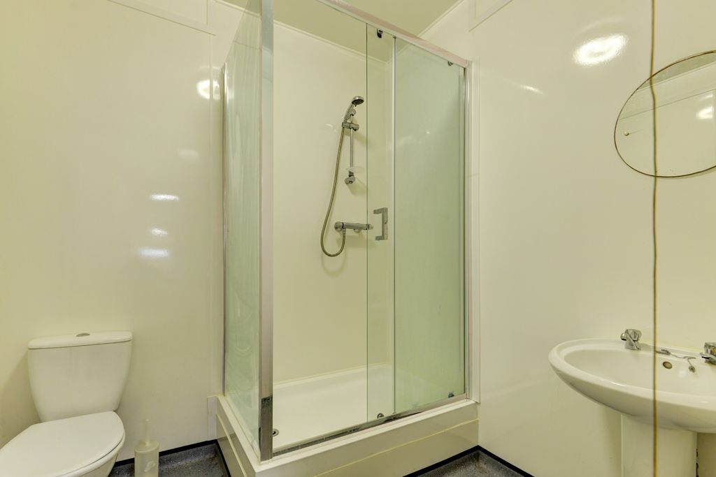 Property photo 3 of 23 A Modern, Clean Bathroom Featuring A Shower Unit, ...