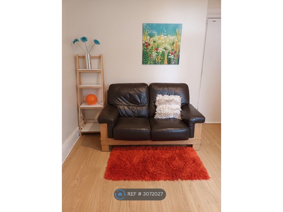 Property photo 1 of 9 Living Room With Leather Sofa