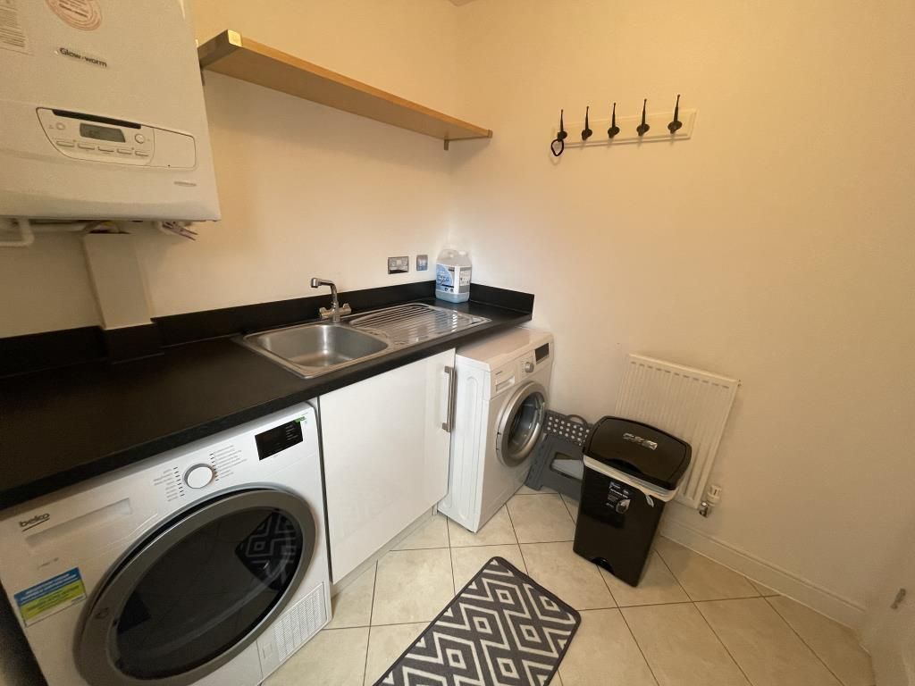 Property photo 2 of 14 Utility Room